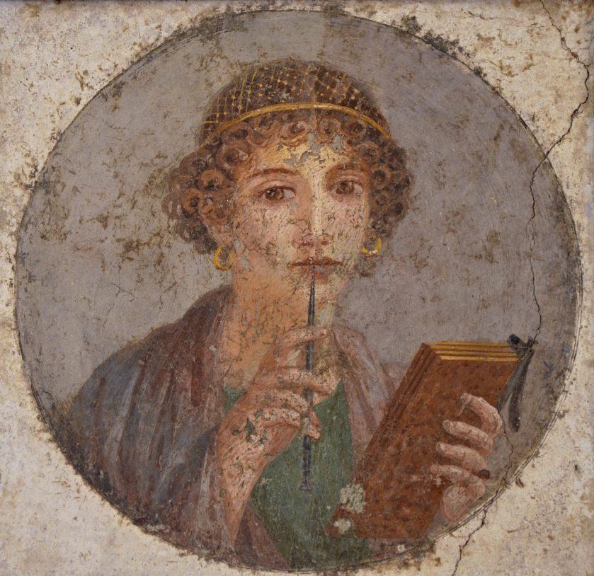 Fresco showing a woman holding writing implements (c. 50 AD)